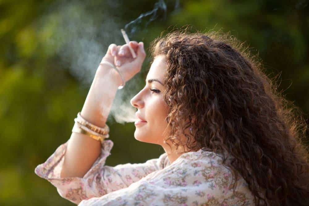 A woman smoking.