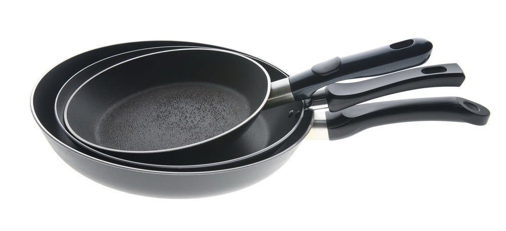 Three pans placed inside each other from largest to smallest.