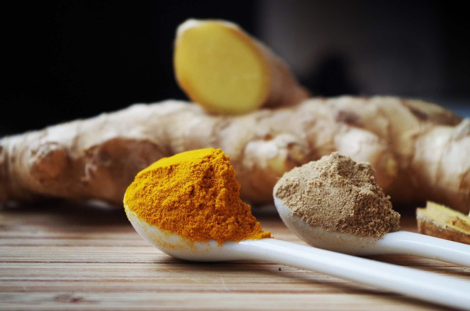 Ginger root and powder with turmeric powder.